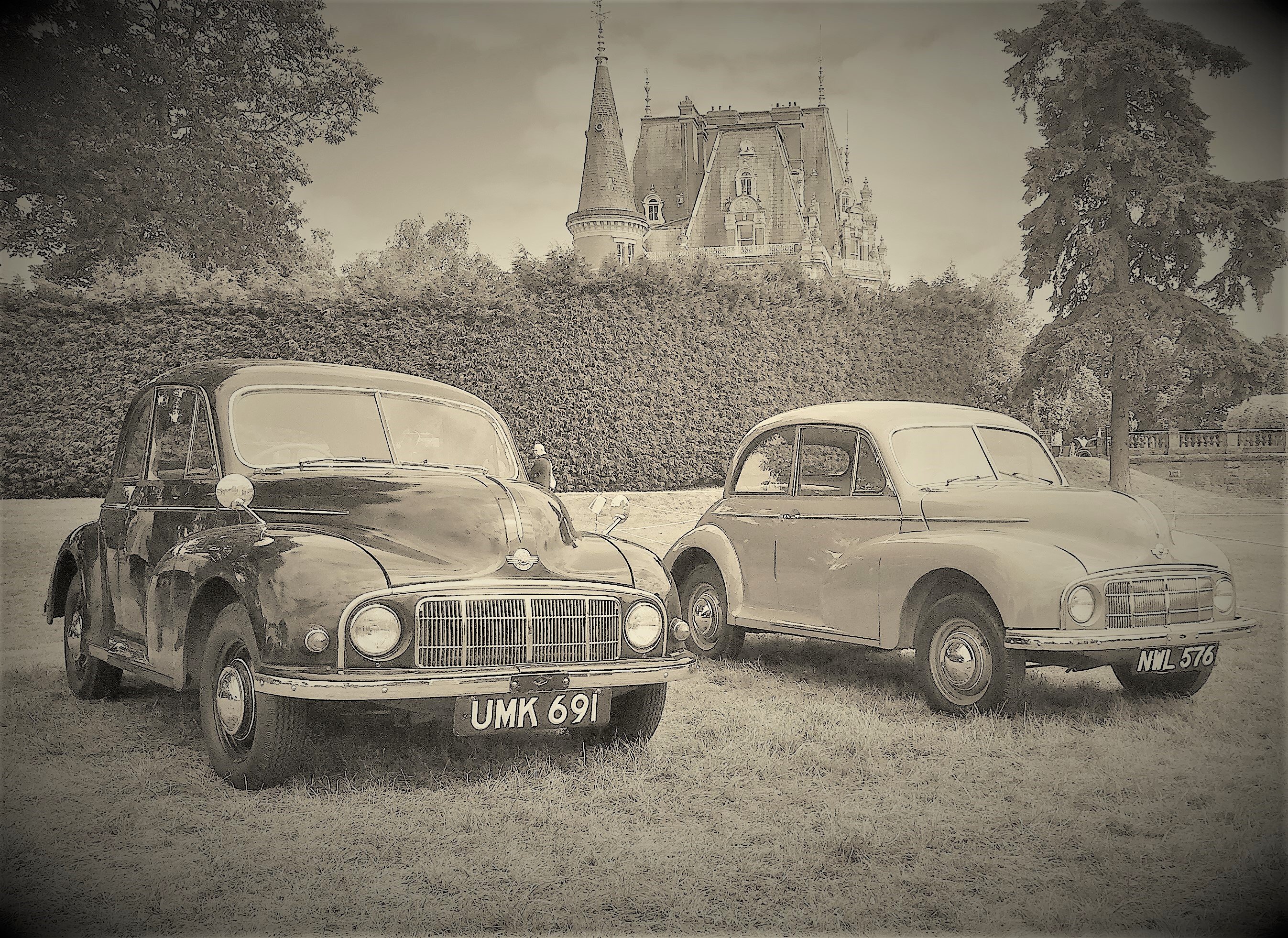 Two morris Minor Lowlights UMK 691 and NWL 691 parked together at Chateau Impney, MMOC National Rally, July 2023 (2).JPG