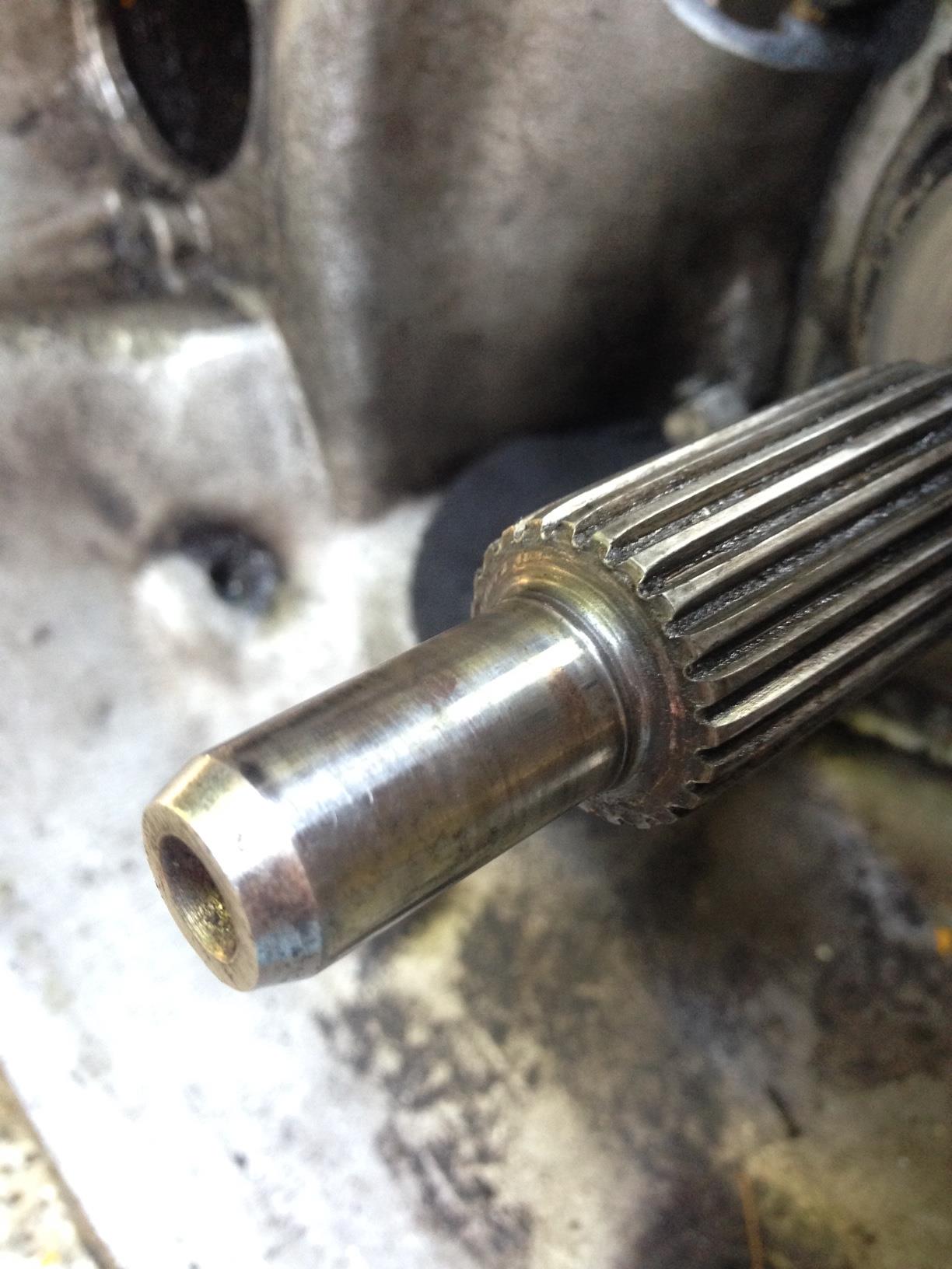main shaft of gearbox, splines appear slightly burred